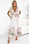 20410-1-609-1 Satynowa sukienka maxi z dekoltem i kwiatowym ombre – elegancja w stylu boho-1